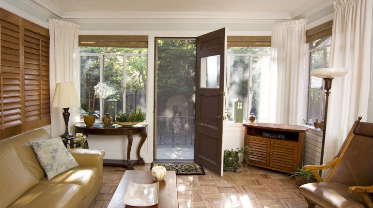 Interior of house looking at front door with Phantom retractable door screens