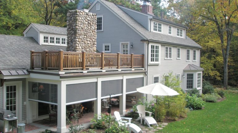 Retractable screens at classic New England Farmhouse