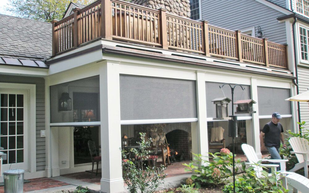 Classic New England home, with screened in porch by Phantom Screens