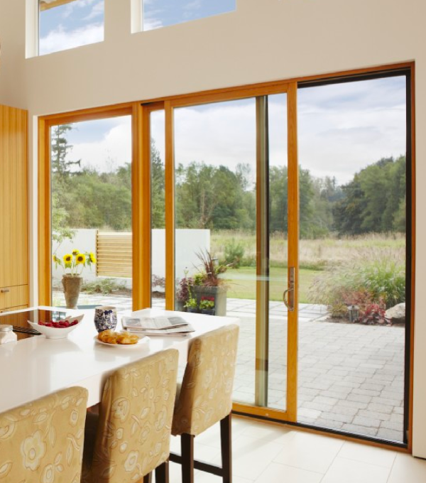 Wooden sliding door with retractable sliding door screens