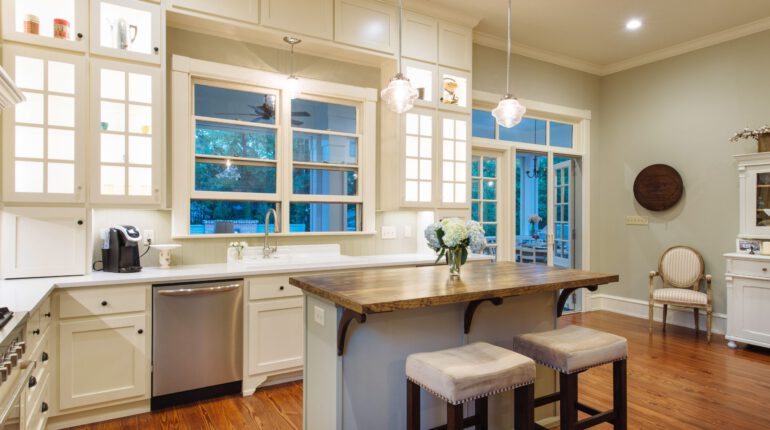 Country kitchen with disappearing large window screens