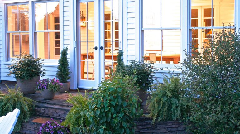 Phantom retractable screens on exterior white French doors