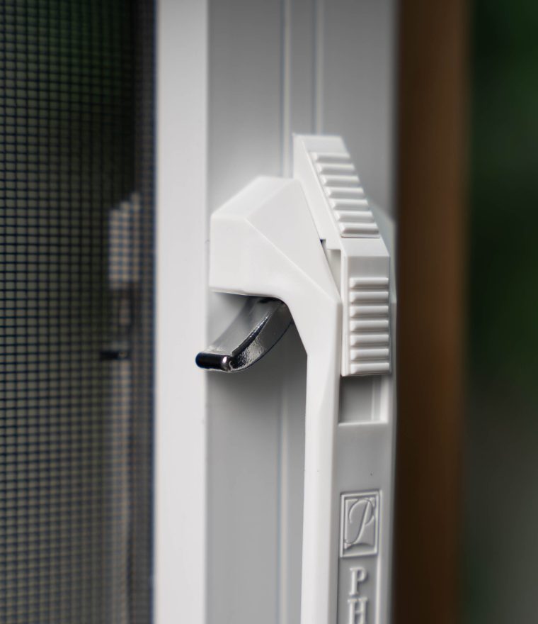 Close up of unlocked retractable door screen